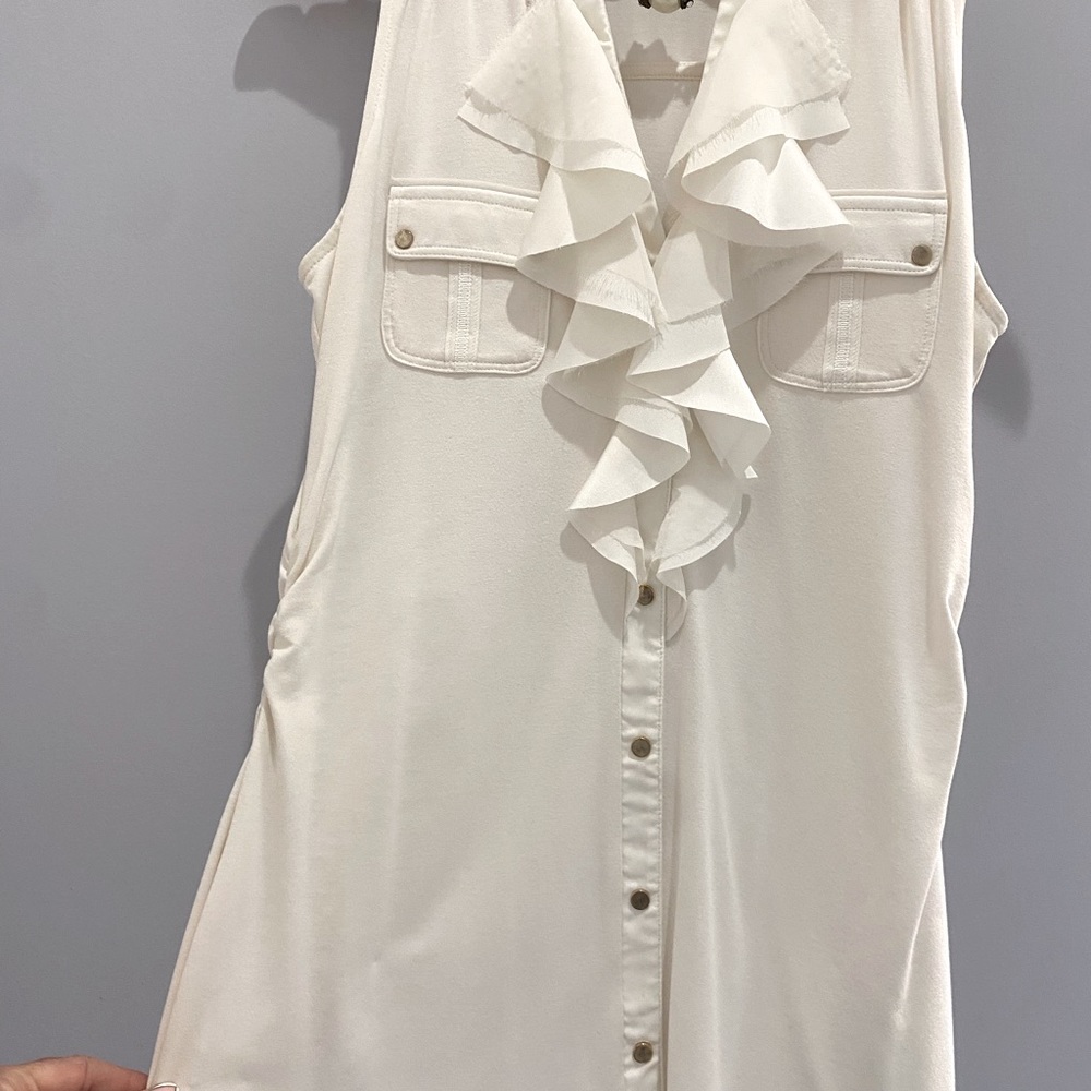 White House Black market, white tank top with ruffle detailing.